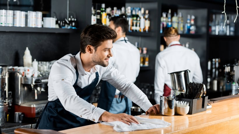 bartender cleaning bar