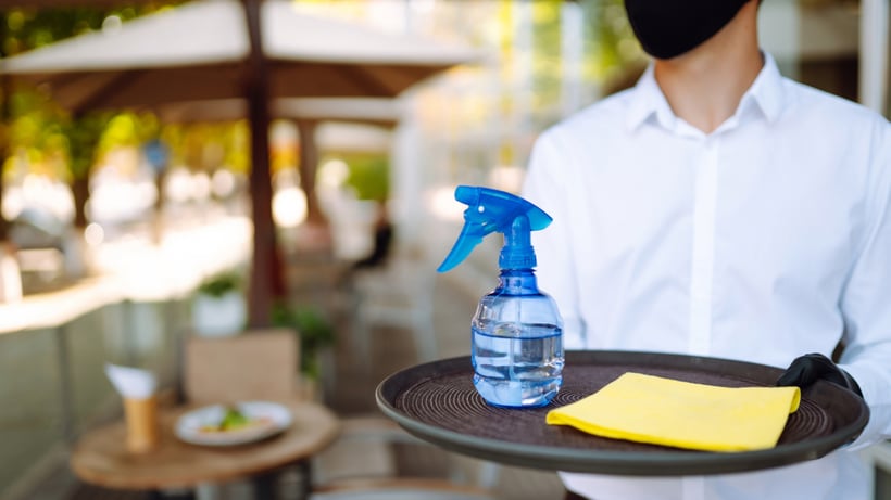 server holding tray with cleaning supplies