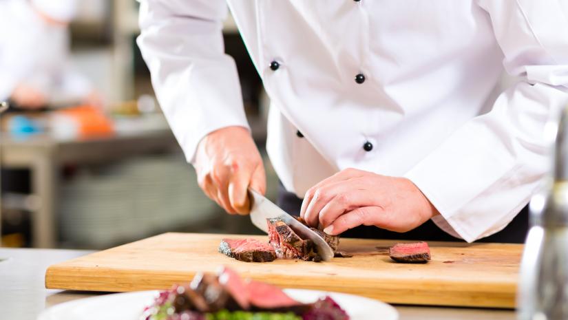 Why It Can Be Dangerous To Cut Meat On A Wooden Board